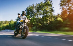 a man riding a motorcycle on a Virginia road